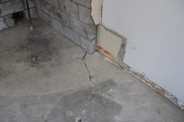 Crack in an interior concrete slab found during a home inspection