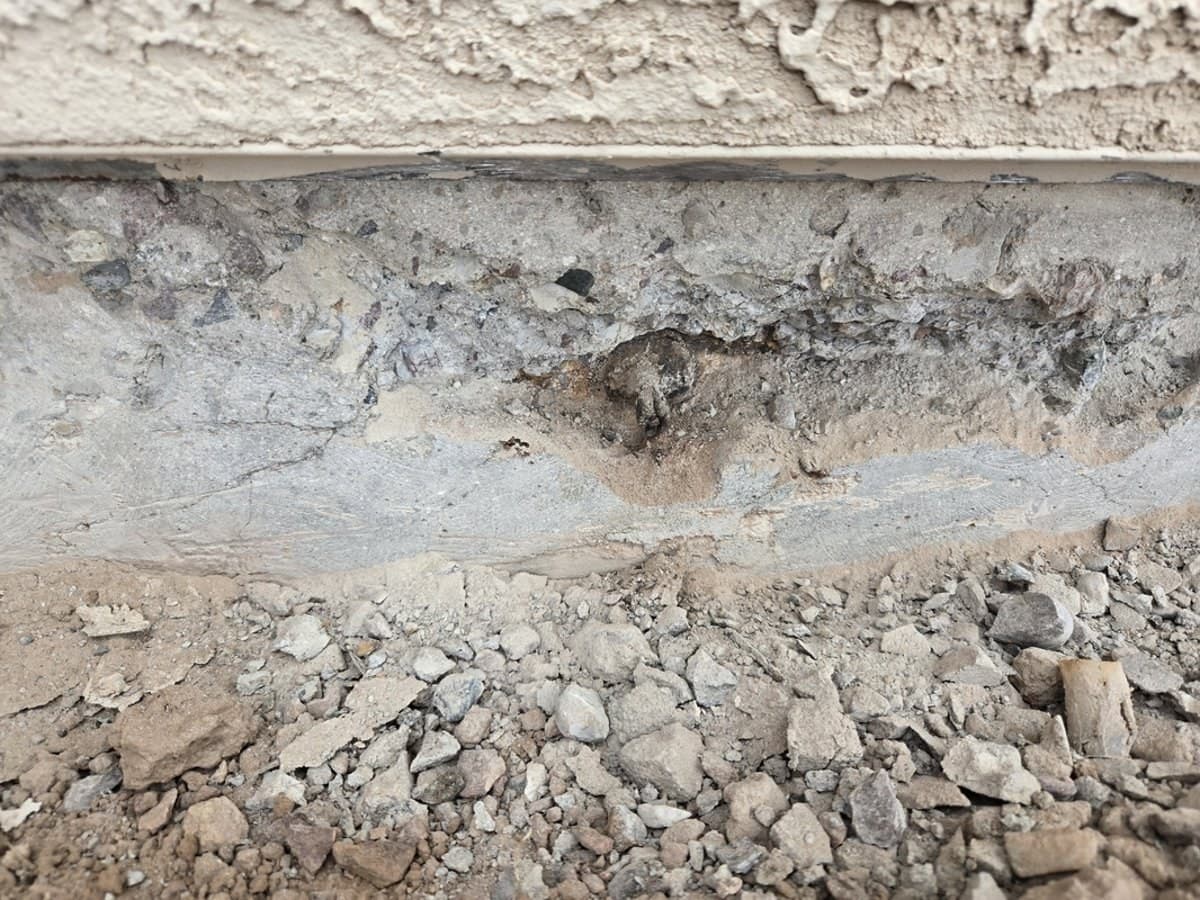 Excavated foundation edge during post-tension anchor repair